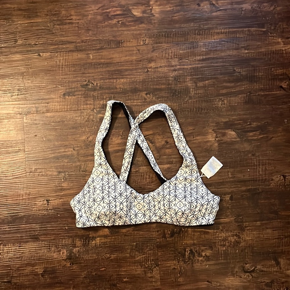 O’Neill bikini top.  M. Reversible. Black and white. Removable padding.